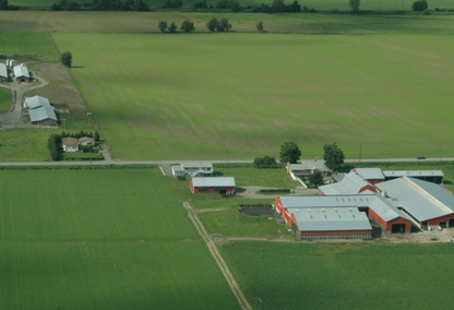 barn in the middle of a cultivated field